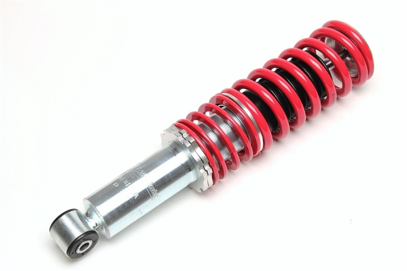TA Technix coil spring strut rear axle from EVOGWNI01 Nissan Almera I, Hatchback